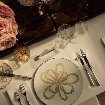 a table with plates and silverware