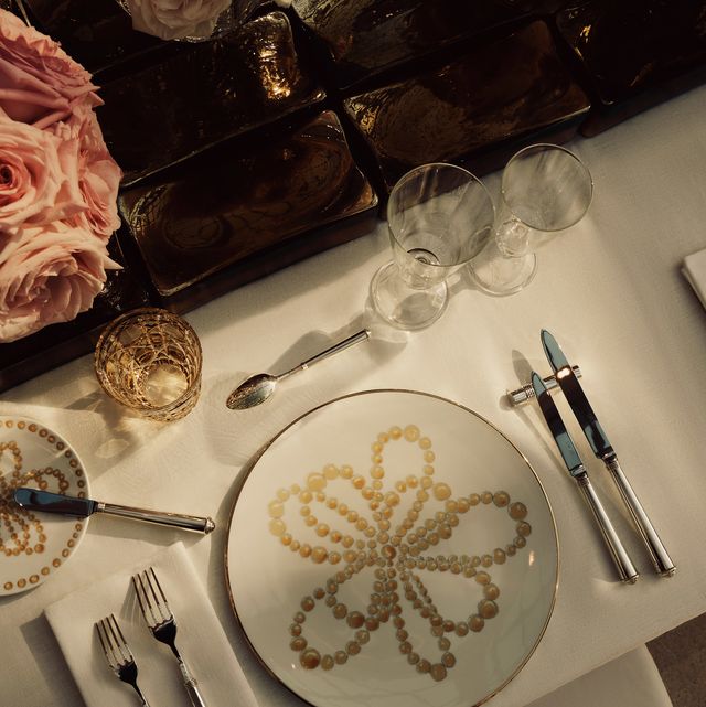 a table with plates and silverware