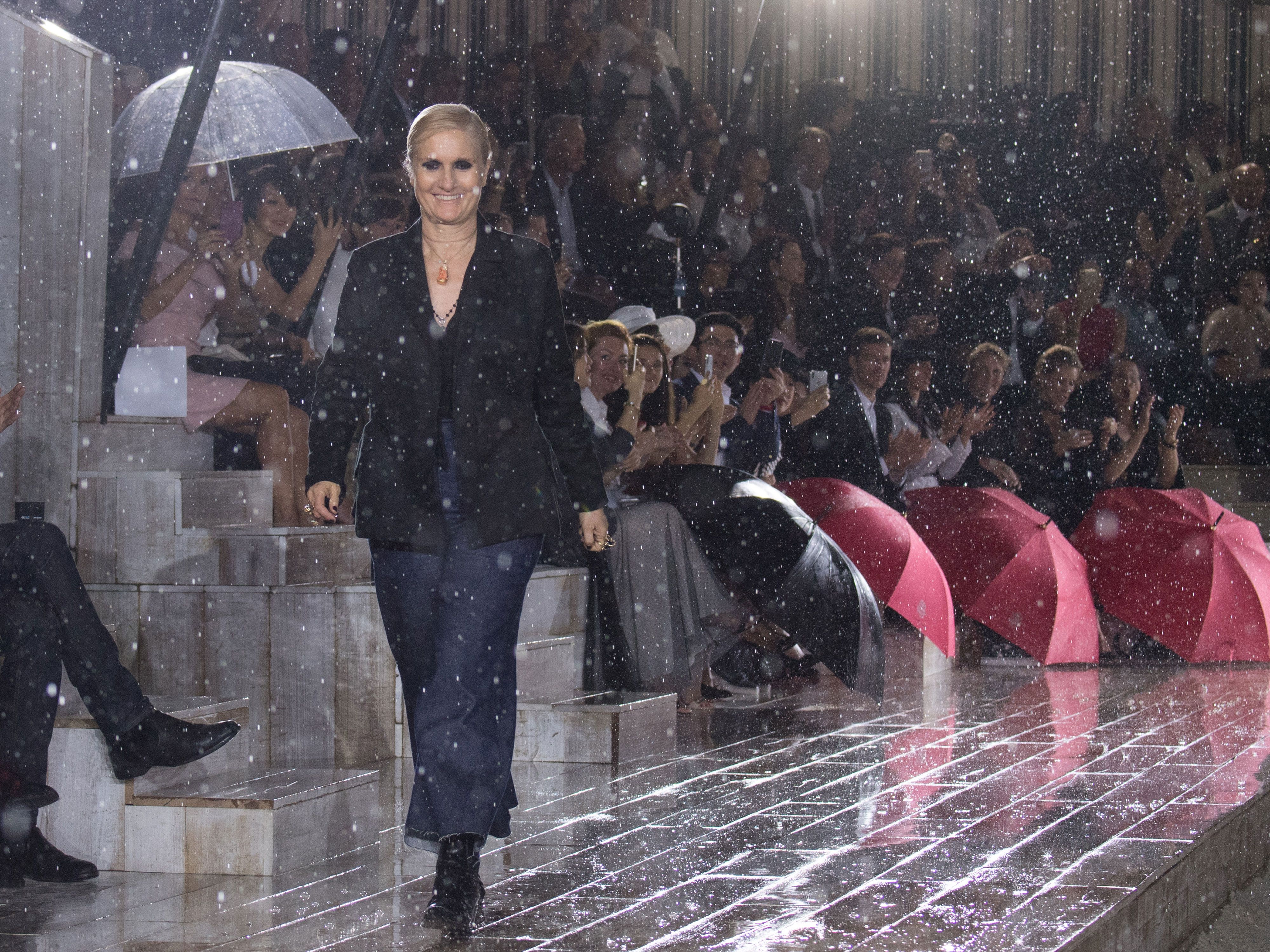 Louis Vuitton fires, then hires shaman to prevent rain at fashion show