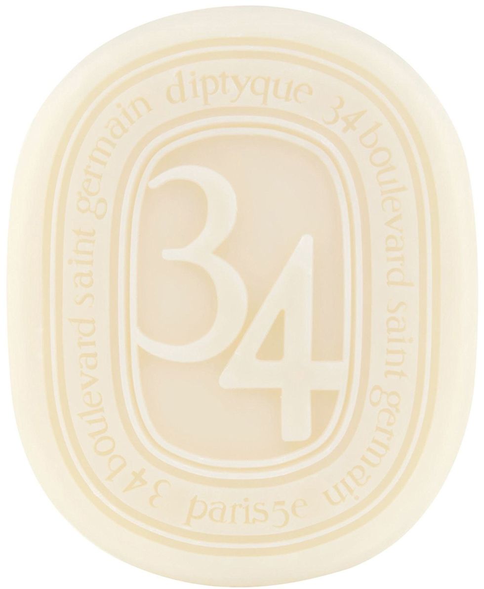 Text, Font, Circle, Beige, Ivory, Material property, Oval, Label, Bottle cap, Trademark, 