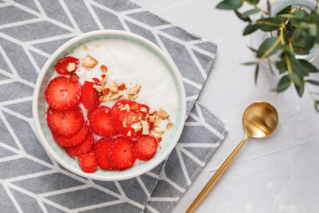 directly above shot of yogurt breakfast in bowl on table