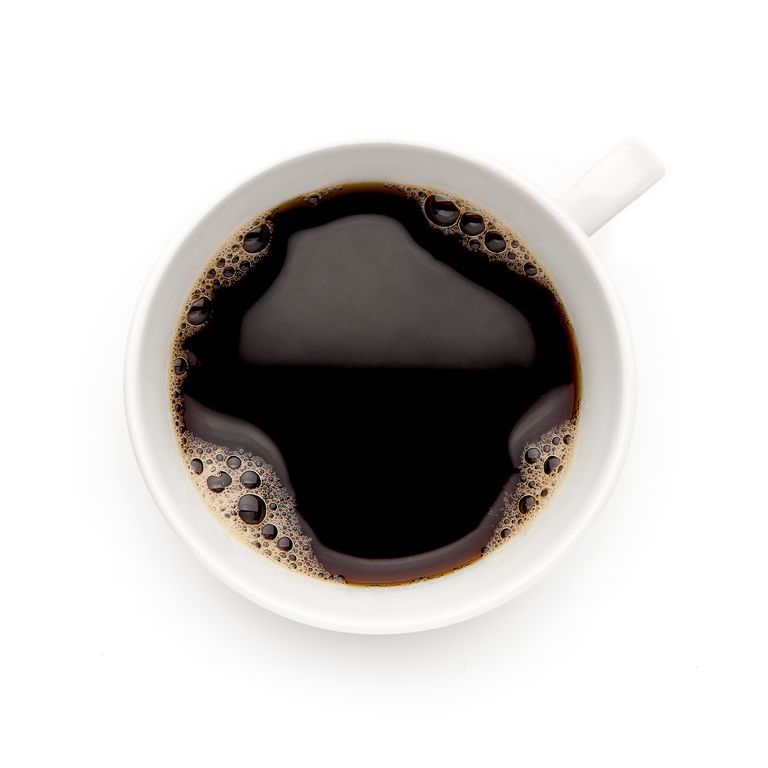 Directly Above Shot Of Coffee Cup Over White Background