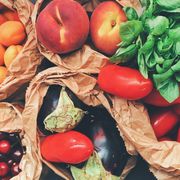 Directly Above Shot Of Fruits And Vegetables In Paper Bags