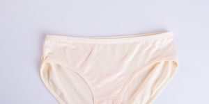 directly above shot of panties over white background