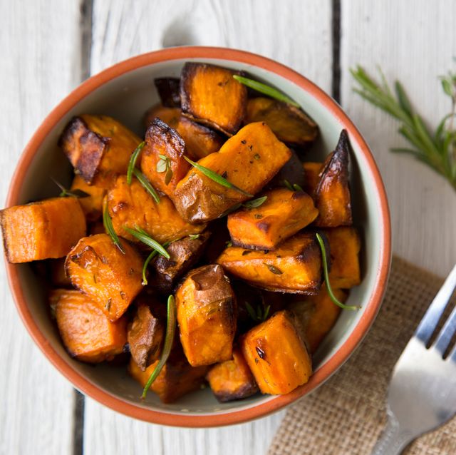 directly above shot of roasted sweet potatoes served in bowl
