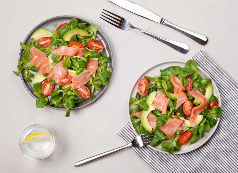 Directly Above Shot Of Salad In Plates On White Background