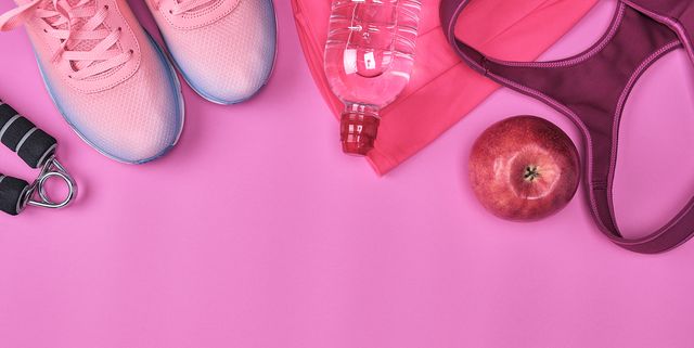 Directly Above Shot Of Sports Equipment On Pink Background