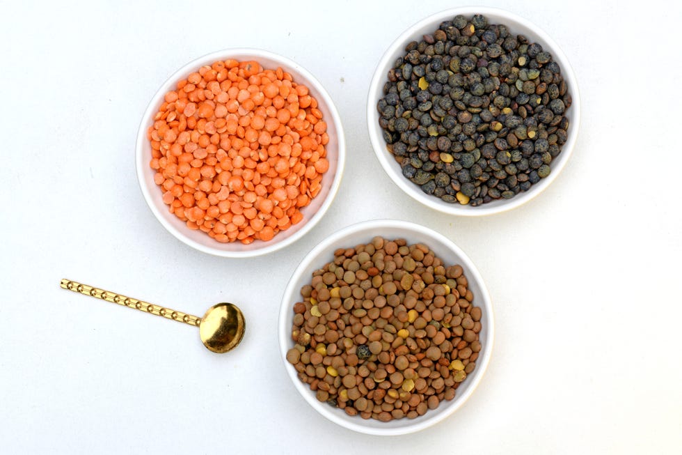 directly above shot of various spices in bowls on white background,france