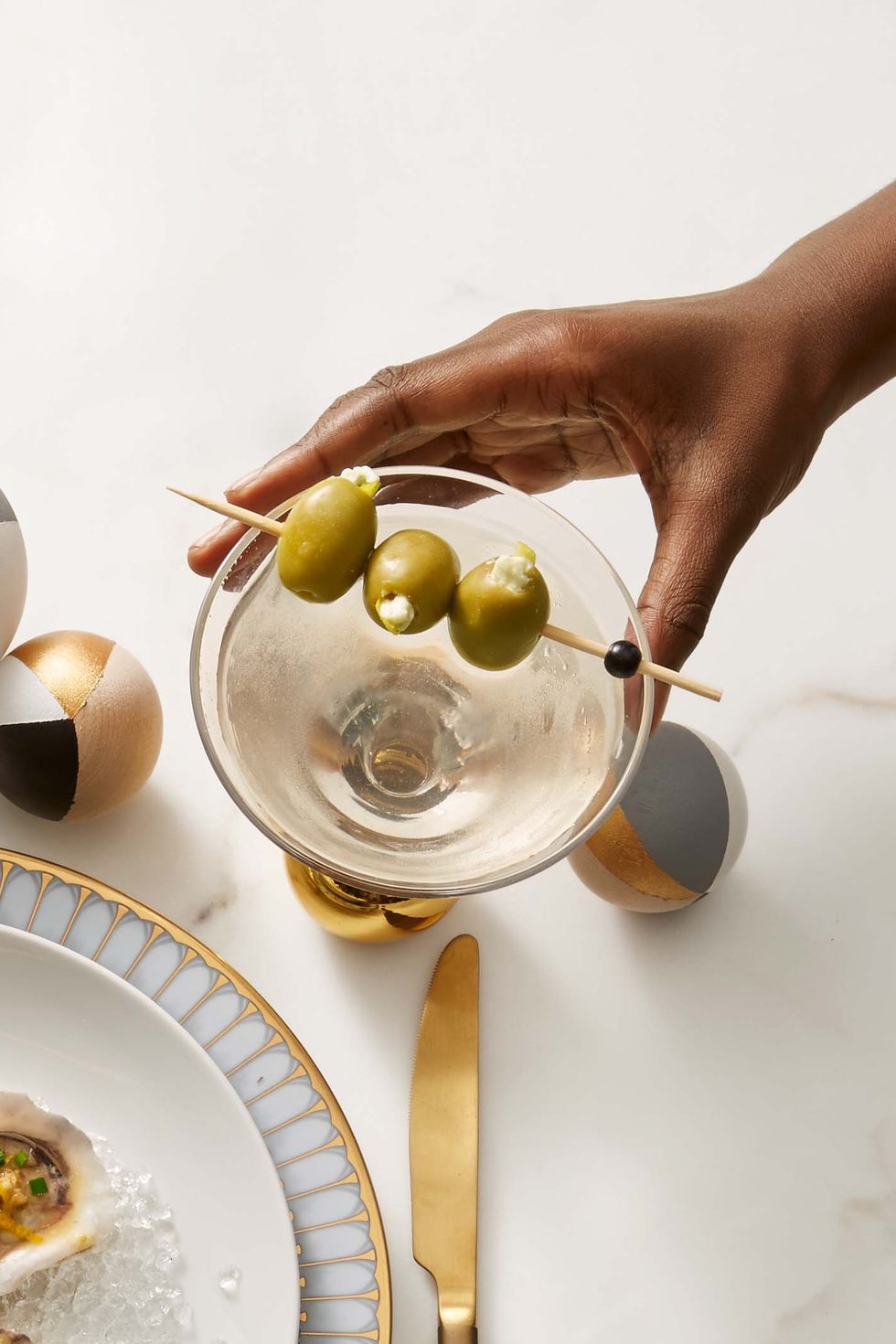dirty martini with stuffed olives