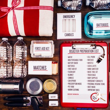 Flat lay of a collection of items for disaster preparedness and emergency planning flat lay of a collection of items for disaster preparedness and emergency planning