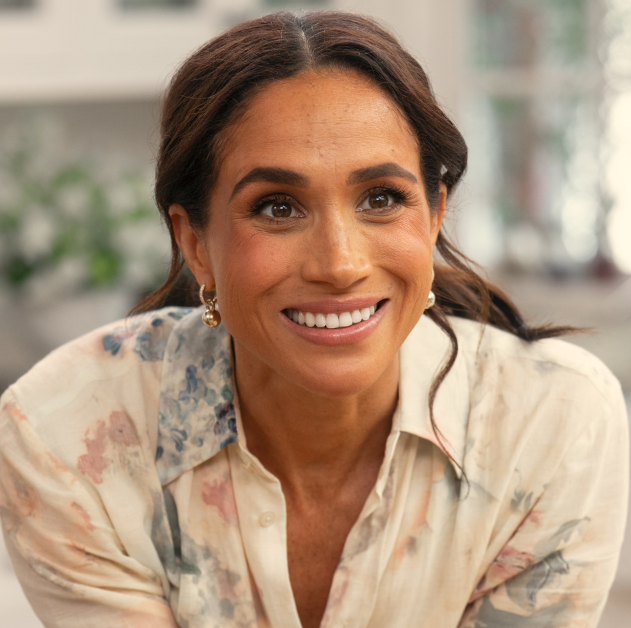 meghan markle wearing a floral shirt in a kitchen setting meghan markle wearing a floral shirt in a kitchen setting