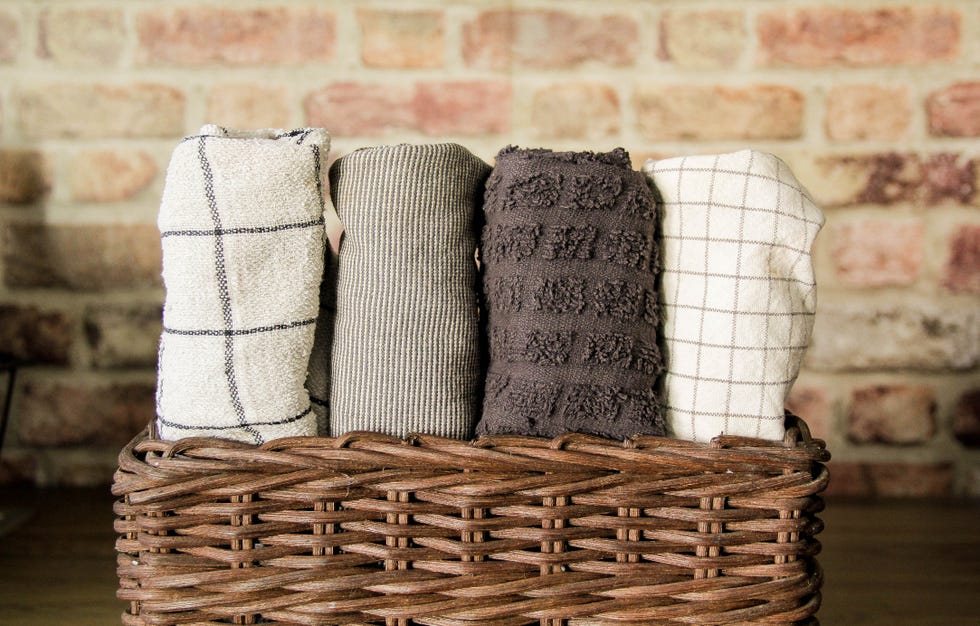 Dishcloths lined up in a basket