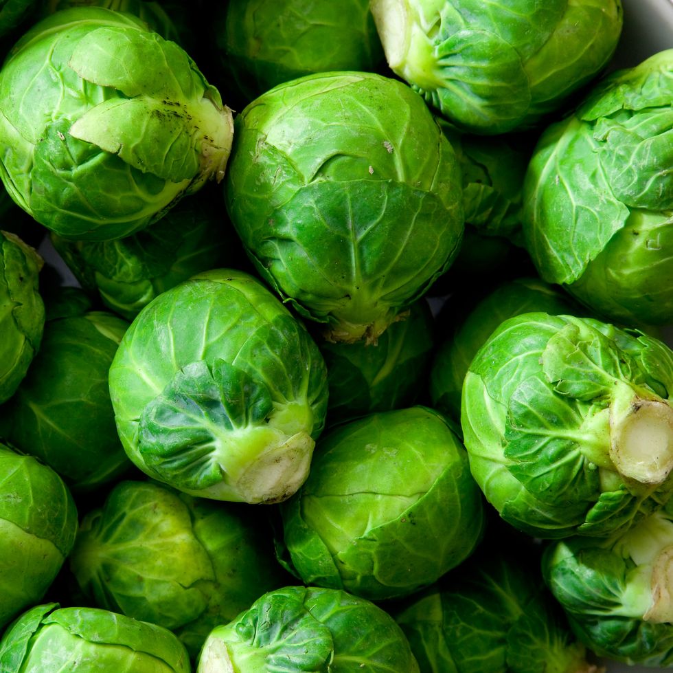 a dish full of uncooked, unpeeled sprouts