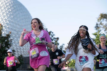 participants in a themed run with disney character costumes