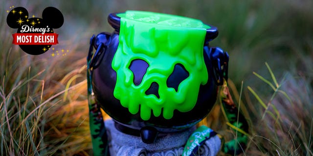 Green, Toy, Helmet, Action figure, Grass, Plant, Fictional character, 