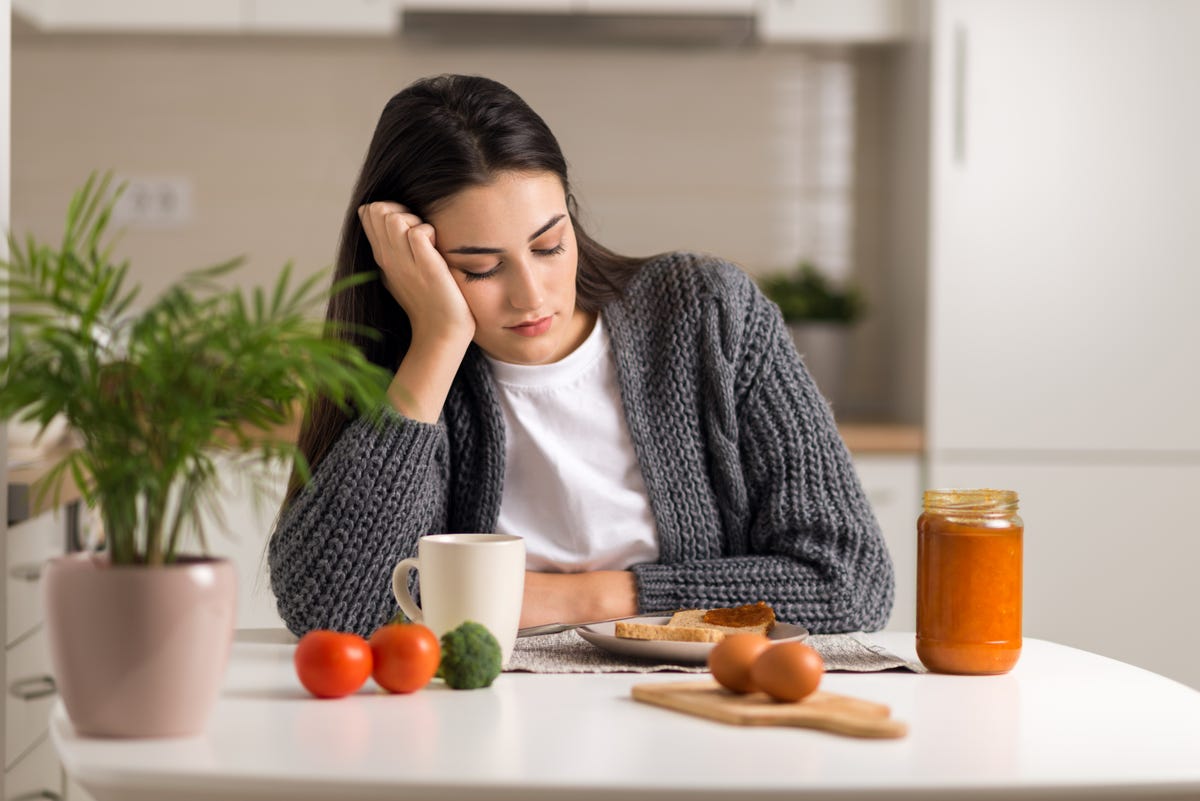 What Is A Food Coma? A Gastroenterologist Explains Why It Happens