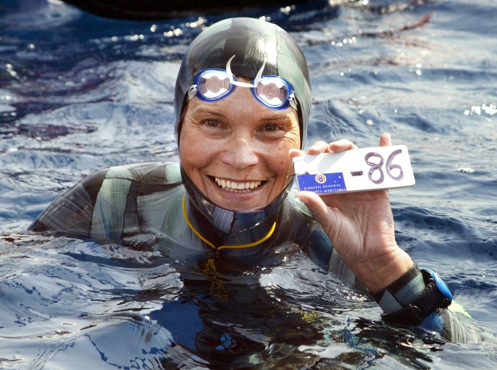 russian natalia molchanova shows the minus 86 metres tag that gives her a win in the first women's free diving world championship 03 september 2005 in villefranche sur mer molchanova retained her world champion status  afp photo jacques munch        photo credit should read jacques munchafp via getty images
