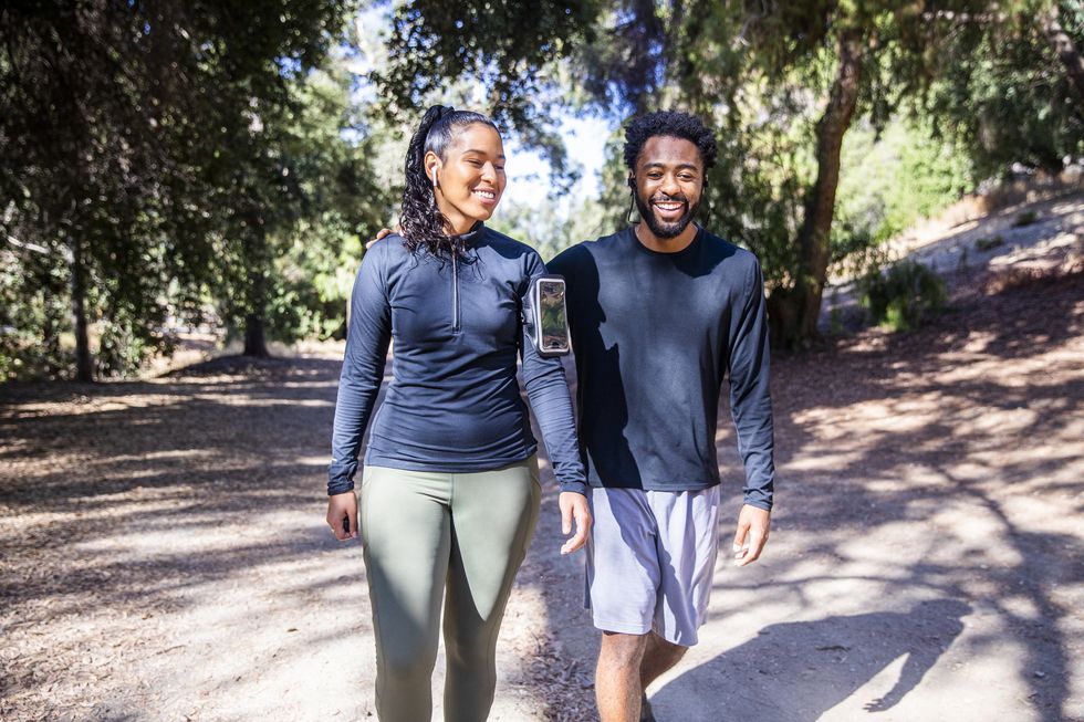 diverse couple walking fitness