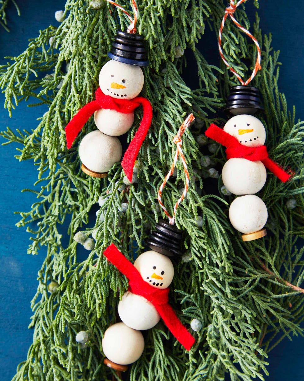 snowmen made from craft beads, button, and a felt scarf