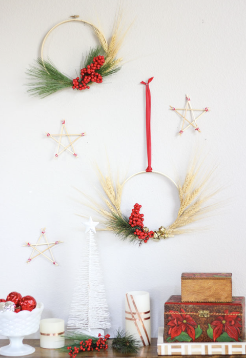 diy christmas wreaths, wheat wreaths hanging on a white wall
