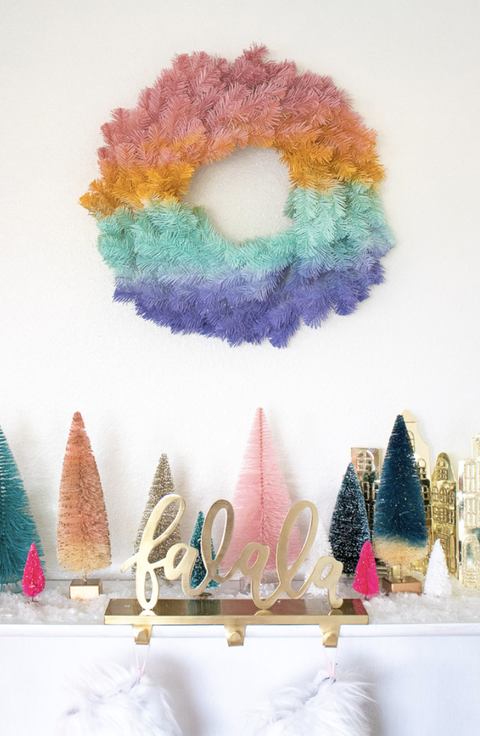 diy christmas wreath, colorful gradient wreath hanging on a white wall