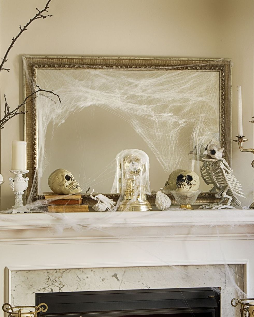 DIY Halloween decoration spider web mantel