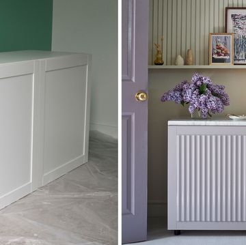 a room with a lilac fluted cabinet and a white counter
