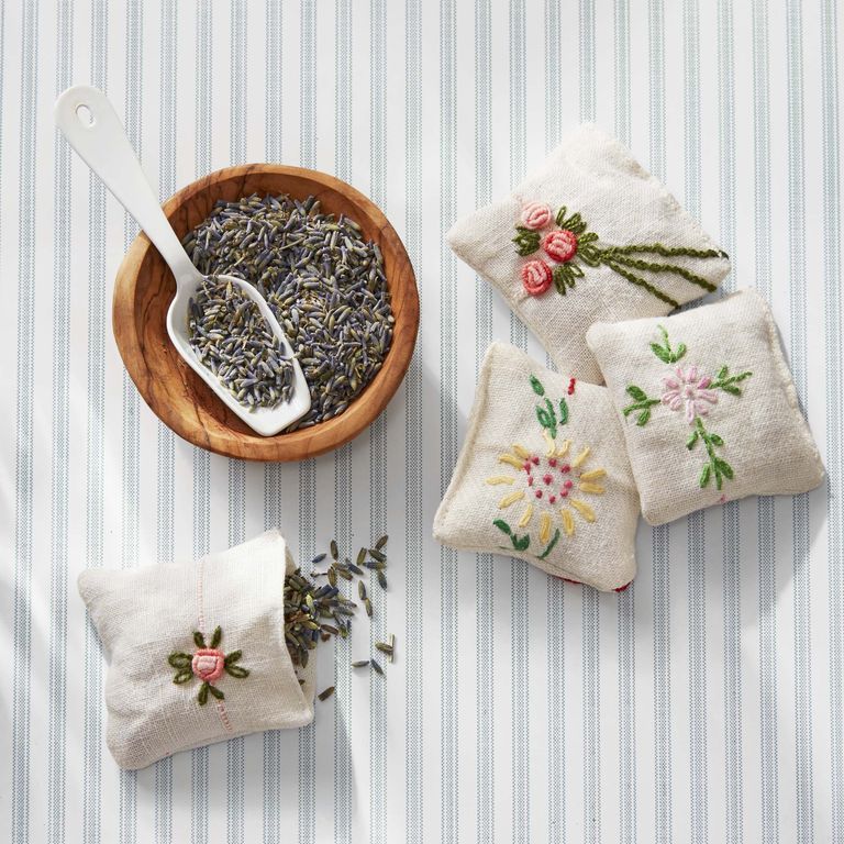 hand stitched lavender pouches with bowl of lavender