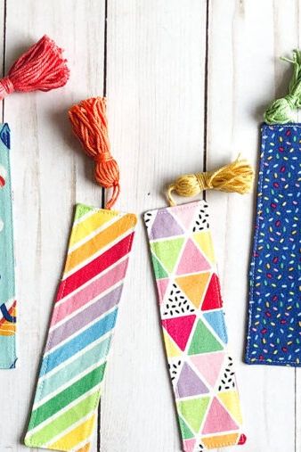 Set of bookmarks with fun patterns on wooden background