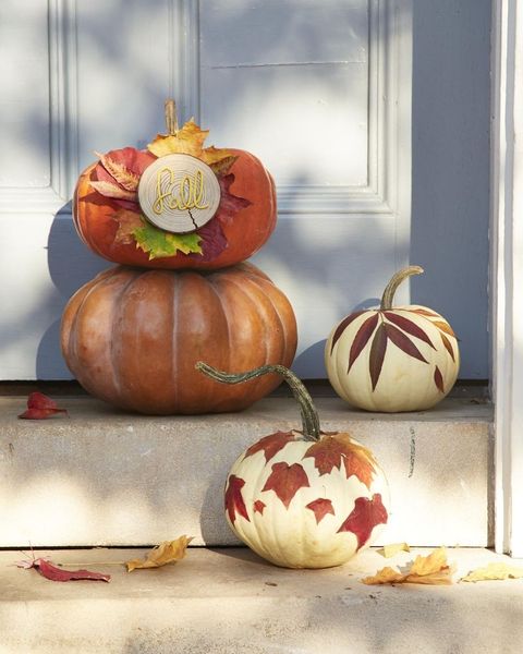 pumpkins on stairs with decoupaged leaves and fall wood circle