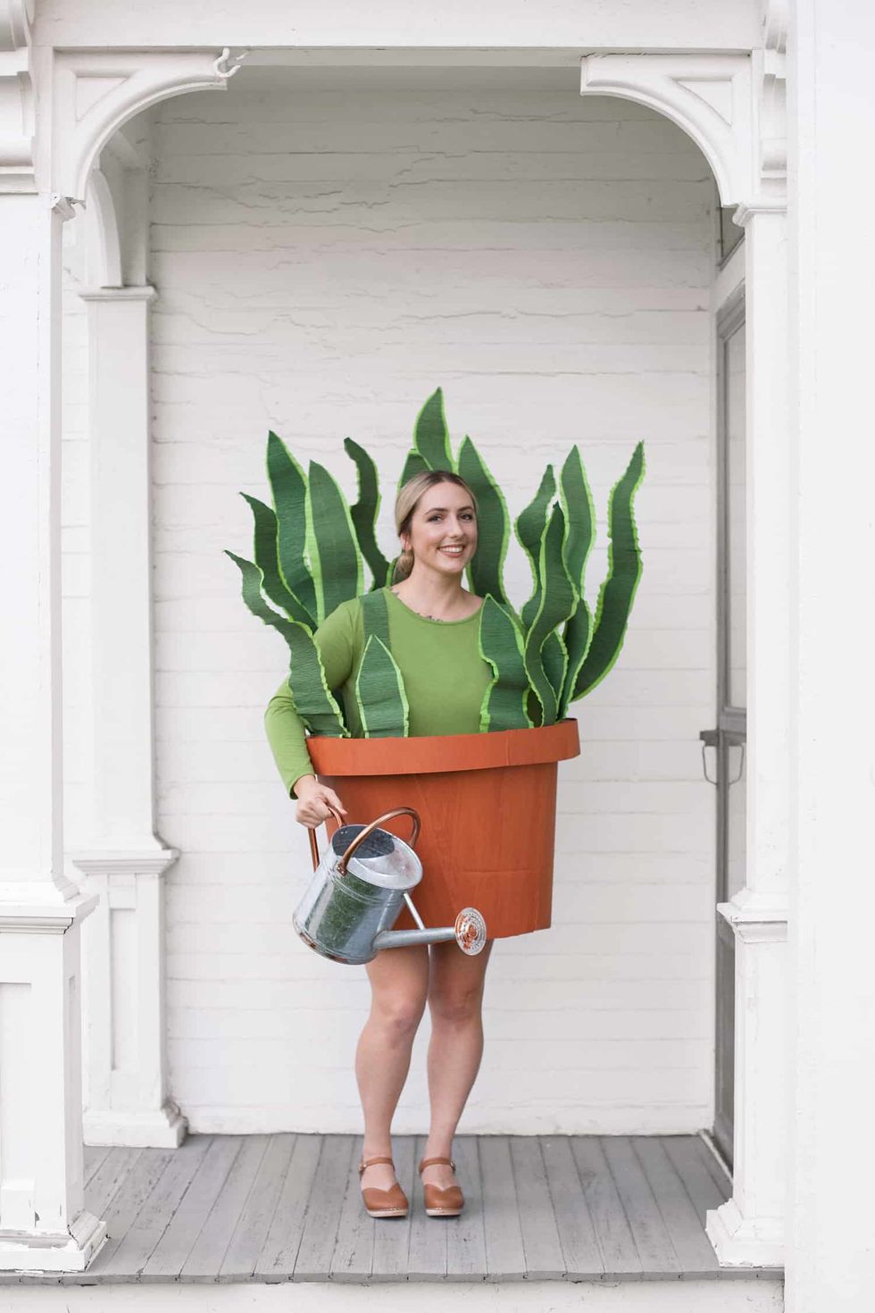 woman wearing diy potted plant costume you can make last minute