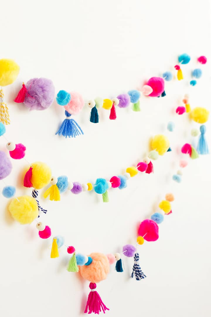 colorful decorative garland with pompoms and tassels
