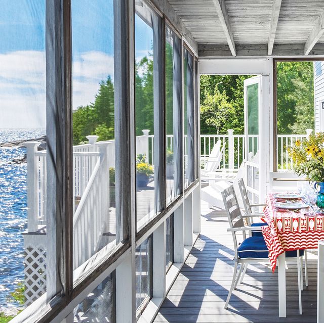 screened in porch with ocean view