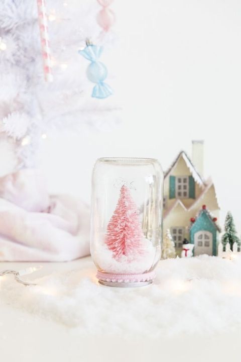 handmade snow globe with pink tree