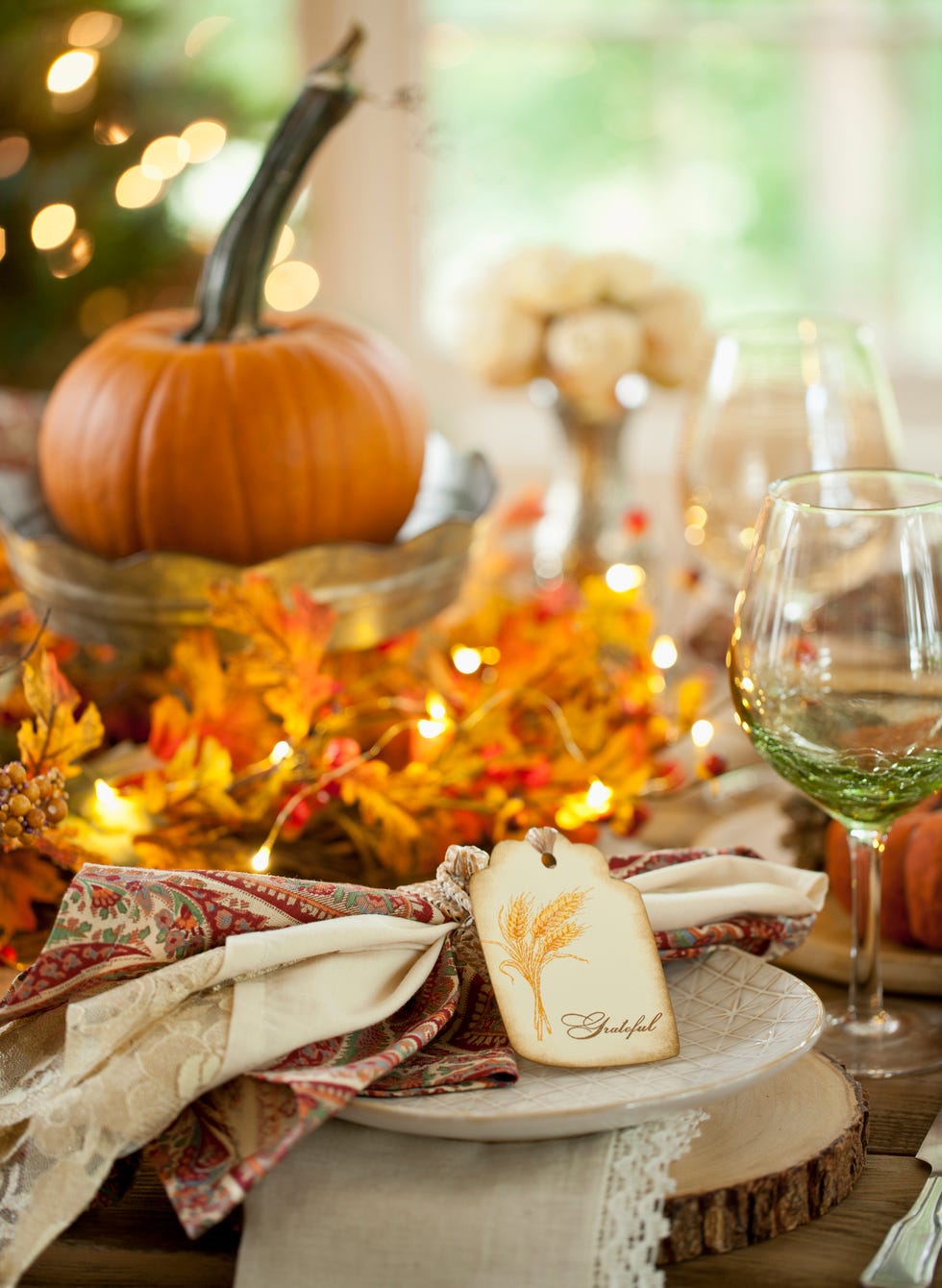 thanksgiving dining table elegant place setting very shallow depth