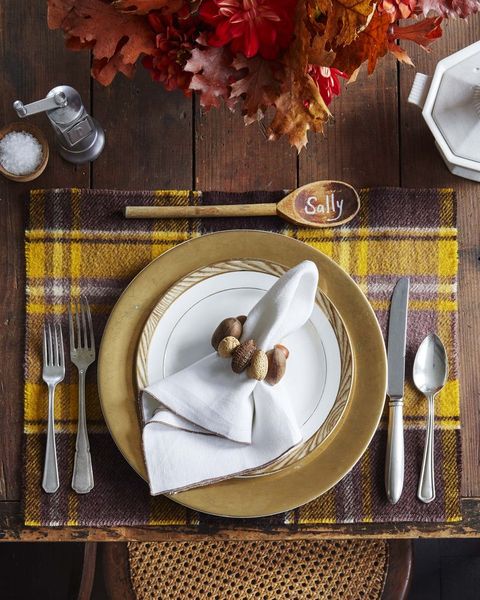 thanksgiving table setting with napkin ring and spoon