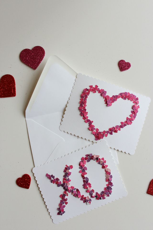 diy valentines day cards with heart and x o designs made out of pink, purple, and red heart shaped confetti