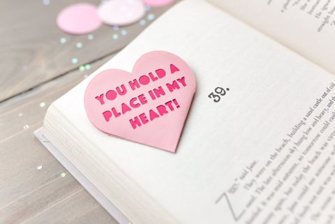 diy valentine gifts, pink heart bookmark inside a book