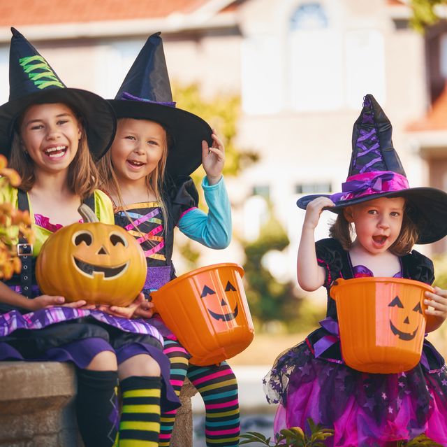 kids dressed as witches on halloween
