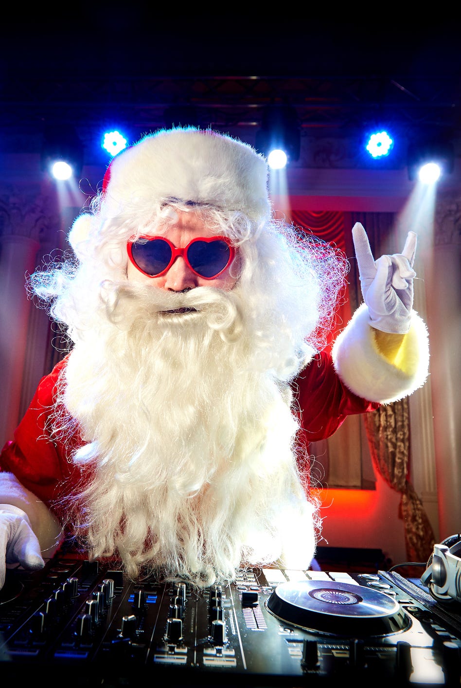 dj santa claus mixing at the party christmas