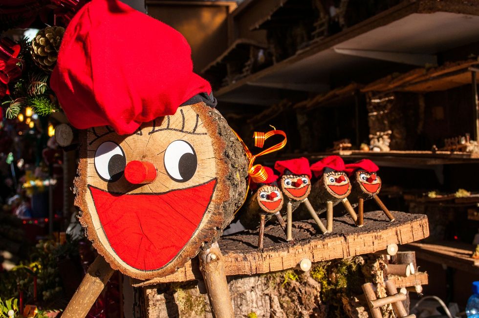 Ti de Nadal a Christmas tradition in Catalonia waits on sale at a Christmas market in Barcelona Spain
