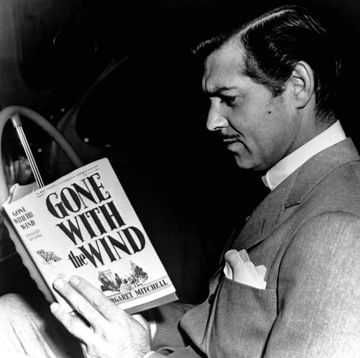 gone with the wind, clark gable reading a copy of gwtw in his car, 1939 