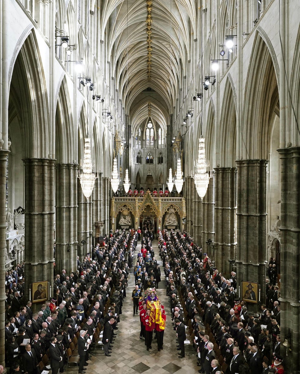 king charles iii, camilla, the queen consort and members of the royal family follow behind the coffin of queen elizabeth ii, draped in the royal standard with the imperial state crown and the sovereign's orb and sceptre,  as it is carried out of westminster abbey after her state funeral, in london, monday sept 19, 2022 the queen, who died aged 96 on sept 8, will be buried at windsor alongside her late husband, prince philip, who died last year danny lawsonpool photo via ap  local caption