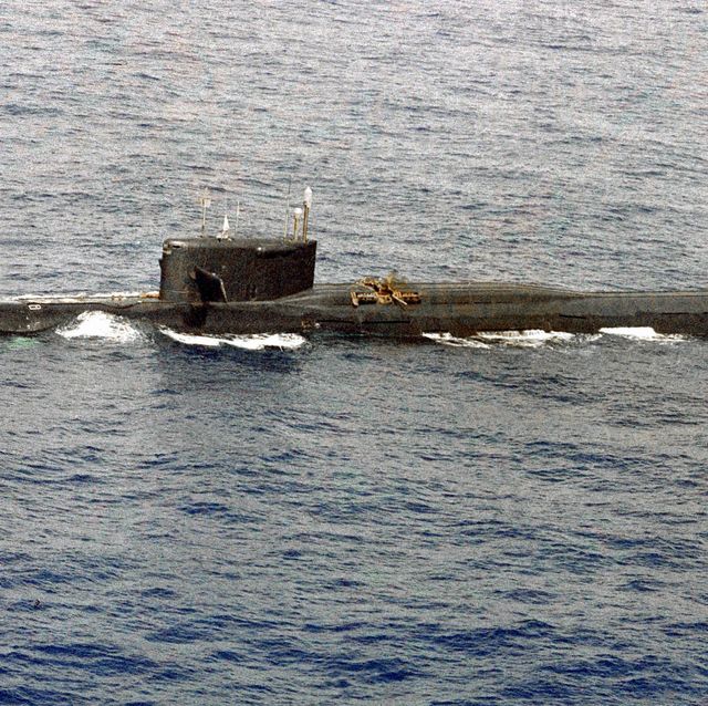 a port view of a soviet yankee class nuclear powered balistic missile submarine that was damaged by an internal liquid missile propellant explosion  three days later the ship sank in 18,000 feet of water