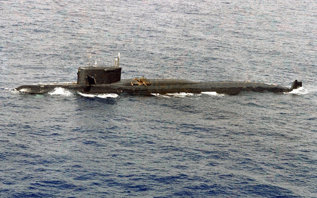 a port view of a soviet yankee class nuclear powered balistic missile submarine that was damaged by an internal liquid missile propellant explosion  three days later the ship sank in 18,000 feet of water