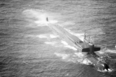 an aerial starboard bow view of a damaged soviet yankee class nuclear powered strategic missile submarine 600 miles off the coast of bermuda  the submarine was damaged when missile propellant exploded  the ship sank on october 6, 1986