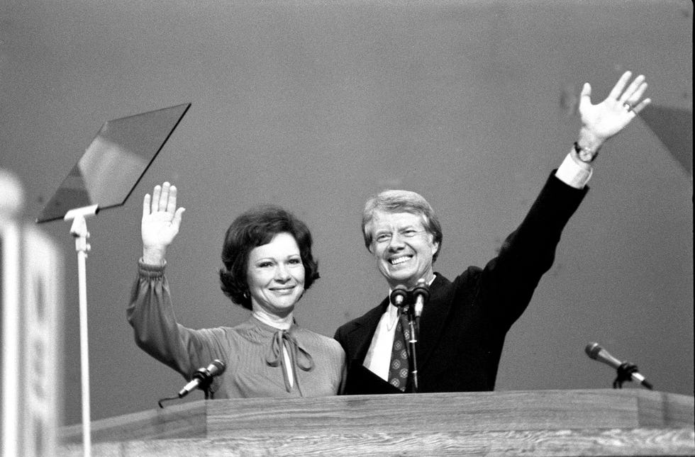 immy and Rosalynn Carter wave to assembled Democratic National Convention after he accepted his party's nomination for presiden