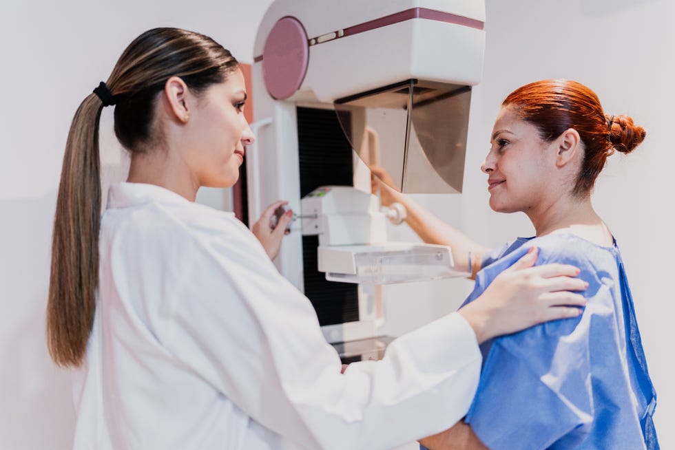 10 breast cancer facts doctor doing mammogram exam on patient at hospital