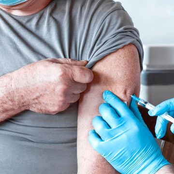 doctor vaccinating senior man elderly people vaccination covid 19 coronavirus vaccine injection