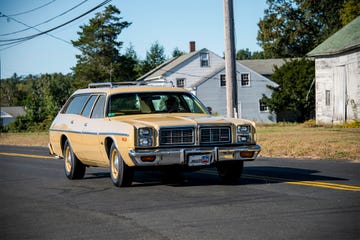 dodge monaco station wagon on two lane road